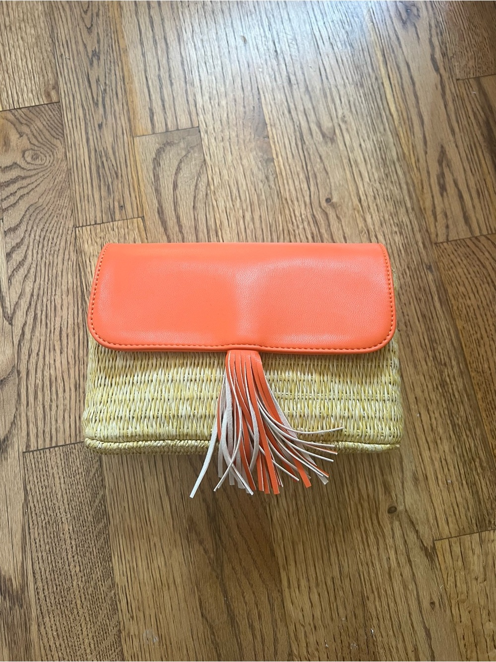 Woven Straw Clutch with Coral Fringe Accent